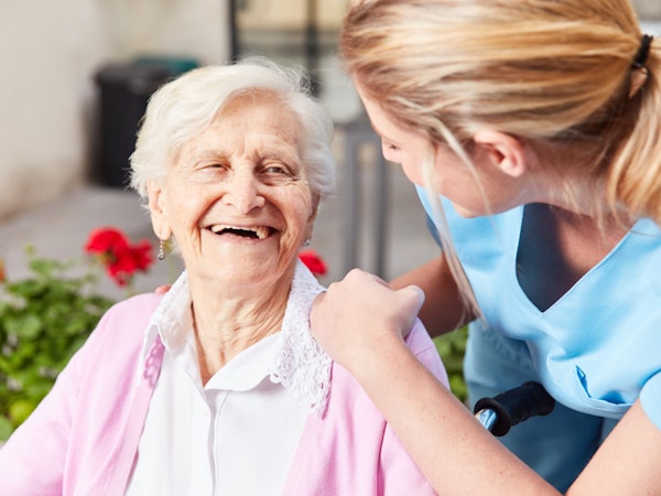 Older women receiving care and happy about it