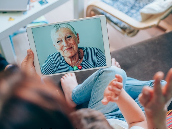Older person on a video call with family